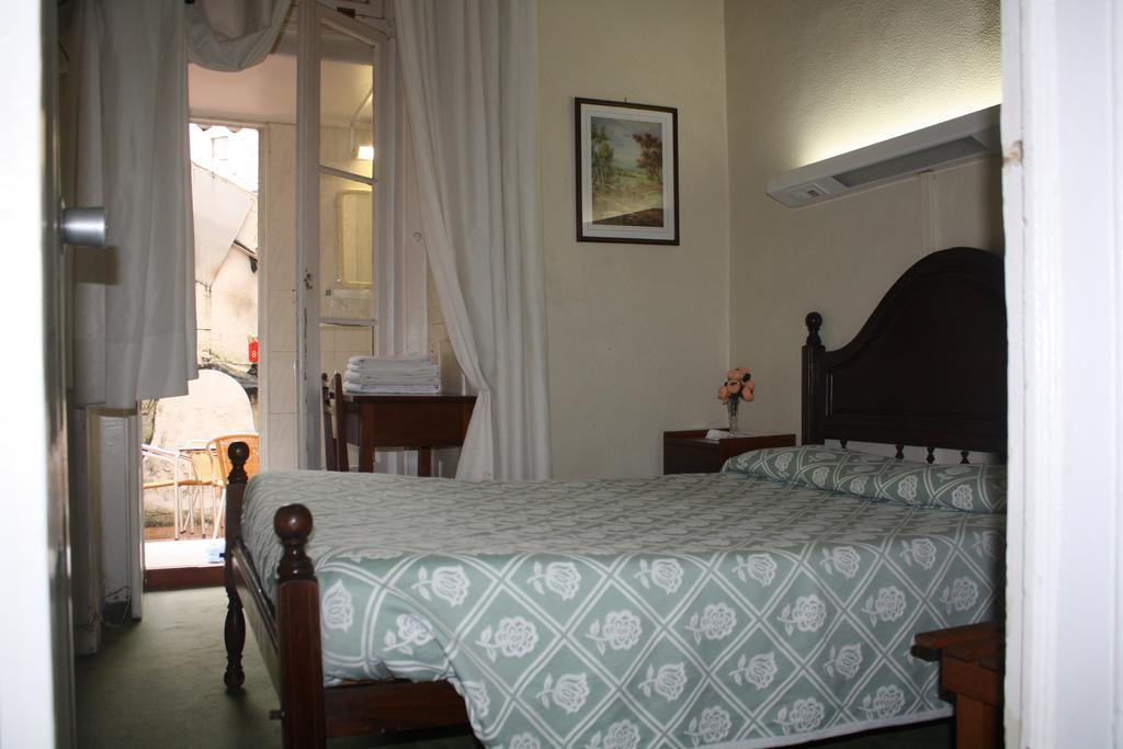Hotel Pensao Residencial Estrela do Mondego Lisboa Habitación foto